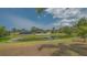 Picturesque pond view with lush greenery and well-maintained landscaping at 5004 32Nd E St, Bradenton, FL 34203