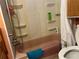 Bathroom with a pink tub and shower combination at 5268 Boca Raton Ave, Sarasota, FL 34234