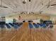 Bright community center with a stage, dance floor, and ample seating at 5268 Boca Raton Ave, Sarasota, FL 34234