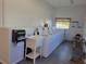 On-site laundry room with multiple washers and dryers at 5268 Boca Raton Ave, Sarasota, FL 34234