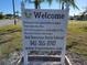 Welcome sign at Tri-Par Estates with community information at 5268 Boca Raton Ave, Sarasota, FL 34234