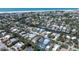 Stunning aerial view of a coastal community, highlighting the home's proximity to the inter coastal and beach at 5385 Avenida Del Mare, Sarasota, FL 34242