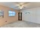 Spacious room showcasing a window and paneled accent wall with blue decor at 5385 Avenida Del Mare, Sarasota, FL 34242