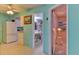 Bright entryway with views into the kitchen, bathroom, and bedroom at 5385 Avenida Del Mare, Sarasota, FL 34242