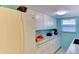 Spacious kitchen with stainless appliances, and featuring ample countertop and storage space at 5385 Avenida Del Mare, Sarasota, FL 34242