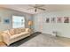 Relaxing living room with a comfy sofa and beach-themed decor at 5385 Avenida Del Mare, Sarasota, FL 34242