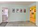 Living room featuring beach-themed decor and an entryway to the kitchen at 5385 Avenida Del Mare, Sarasota, FL 34242