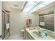 Bathroom includes a single sink vanity, shower and tub combo, and toilet at 6096 Wilshire Blvd # 9, Sarasota, FL 34238