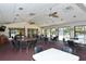 Clubhouse features spacious room with pool view and an American flag at 6096 Wilshire Blvd # 9, Sarasota, FL 34238