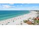 A beautiful beach view of the Gulf of Mexico showing clear turquoise water and white sands at 6204 Midnight Pass Rd # 201, Sarasota, FL 34242