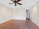 Open living room with tiled flooring, a ceiling fan, and recessed lighting for a cozy atmosphere at 635 N Jefferson Ave # 635, Sarasota, FL 34237