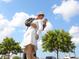 Depicts a sailor kissing a Personal in a Victory over Japan Day embrace, captured in a nostalgic statue at 635 N Jefferson Ave # 635, Sarasota, FL 34237