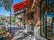 Storefront in historic downtown with red awning and large display windows at 635 N Jefferson Ave # 635, Sarasota, FL 34237