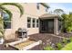 Outdoor area with a built in grill and a screened-in porch perfect for entertaining or relaxation at 6356 Mighty Eagle Way, Sarasota, FL 34241