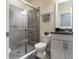 Bathroom features a glass shower, modern toilet, and stylish sink with ample space at 6356 Mighty Eagle Way, Sarasota, FL 34241