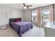 Inviting bedroom with large windows, a comfortable bed, and soft natural light at 6356 Mighty Eagle Way, Sarasota, FL 34241