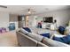 Large bonus room with a tv area, sofa, and lots of space for fun at 6356 Mighty Eagle Way, Sarasota, FL 34241