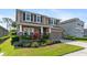 Beautiful two-story home with well-maintained landscaping, shutters and a two-car garage at 6356 Mighty Eagle Way, Sarasota, FL 34241