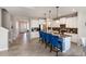 Spacious kitchen featuring a central island with bar seating and modern appliances for culinary enthusiasts at 6356 Mighty Eagle Way, Sarasota, FL 34241