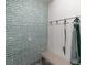 Stylish mudroom featuring unique wallpaper, coat hooks, and a bench with storage at 6356 Mighty Eagle Way, Sarasota, FL 34241
