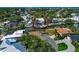 Aerial view of a waterfront property with a private dock and access to the bay at 681 Avenida De Mayo, Sarasota, FL 34242