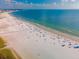 Gorgeous beach community with white sands, turquoise water and beachgoers enjoying the beautiful coastal scenery at 681 Avenida De Mayo, Sarasota, FL 34242