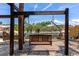 Outdoor wooden swing set in a sandy backyard overlooking the canal and lush foliage at 681 Avenida De Mayo, Sarasota, FL 34242