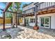 Covered patio with ceiling fan and an outdoor seating area at 681 Avenida De Mayo, Sarasota, FL 34242