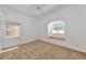 Bright bedroom with a ceiling fan and natural light at 681 Avenida De Mayo, Sarasota, FL 34242