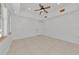 Bright bedroom boasts tile flooring, recessed lighting, and ample natural light from large windows at 681 Avenida De Mayo, Sarasota, FL 34242