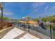 Home's dock with a boat lift and canal view on a sunny day at 681 Avenida De Mayo, Sarasota, FL 34242