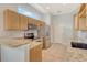Beautiful kitchen featuring stainless steel appliances and granite countertops with ample natural light at 7124 Rue De Palisades # 21, Sarasota, FL 34238
