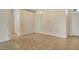 Open living area with tile flooring, neutral colors, and plenty of natural light at 7124 Rue De Palisades # 21, Sarasota, FL 34238