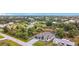 Amazing aerial view of the home with an attached two car garage and attractive driveway at 7152 Bougainvillea St, Englewood, FL 34224
