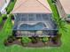 Aerial shot of a screened in pool and patio at 8911 Heritage Sound Dr, Bradenton, FL 34212