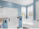 Bright bathroom with a soaking tub, walk-in glass shower, and neutral tones for a spa-like experience at 8911 Heritage Sound Dr, Bradenton, FL 34212