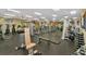 Spacious community gym with modern equipment, weights, and ample workout space at 8911 Heritage Sound Dr, Bradenton, FL 34212