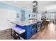 Kitchen with large island with seating, stainless appliances, and an open-concept layout at 8911 Heritage Sound Dr, Bradenton, FL 34212