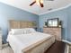 Serene main bedroom with soft lighting, plush bedding, and elegant furnishings create a relaxing retreat at 8911 Heritage Sound Dr, Bradenton, FL 34212