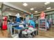 Well-stocked pro shop with displays of golf apparel, hats, and accessories on tables and shelves at 8911 Heritage Sound Dr, Bradenton, FL 34212