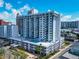 A high-rise condominium complex with a rooftop pool and spacious balconies for residents at 101 S Gulfstream Ave # 16C, Sarasota, FL 34236