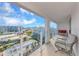 Enjoy city views from this spacious balcony with comfortable seating at 101 S Gulfstream Ave # 16C, Sarasota, FL 34236