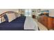 Cozy bedroom with dresser and waterfront view at 101 S Gulfstream Ave # 16C, Sarasota, FL 34236