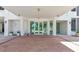 Beautiful and inviting entrance with water view through the glass doors at 101 S Gulfstream Ave # 16C, Sarasota, FL 34236
