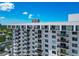 Exterior of a modern condo building with many balconies offering views of the surrounding cityscape at 101 S Gulfstream Ave # 16C, Sarasota, FL 34236