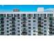 Close-up of an apartment building with multiple balconies, offering residents private outdoor spaces in a modern, urban setting at 101 S Gulfstream Ave # 16C, Sarasota, FL 34236