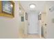 Entryway leading to the living spaces and laundry area, creating a welcoming entrance at 101 S Gulfstream Ave # 16C, Sarasota, FL 34236