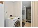Bosch washer in the laundry area, conveniently located near the bathroom at 101 S Gulfstream Ave # 16C, Sarasota, FL 34236