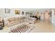 Spacious living area featuring a decorative rug, neutral walls, and ample space for entertaining at 101 S Gulfstream Ave # 16C, Sarasota, FL 34236