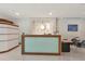 Modern condo lobby with reception desk, contemporary decor, creating a welcoming and professional entrance at 101 S Gulfstream Ave # 16C, Sarasota, FL 34236